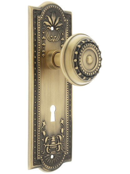 Meadows Design Mortise Lock Set With Matching Knobs in Antique Brass.